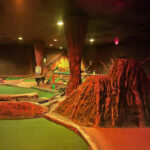 Indoor Playing Area With Uneven Surfaces, Obstacles, and Low Lighting